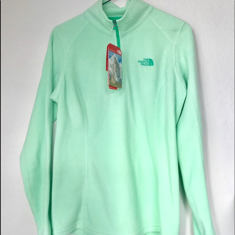The North Face 1/4 Zip fleece. Mint Green